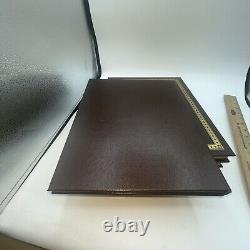 Livre relié en cuir de la maison d'édition Eaton sur les grandes batailles de la Seconde Guerre mondiale, de la Guerre civile et du Vietnam